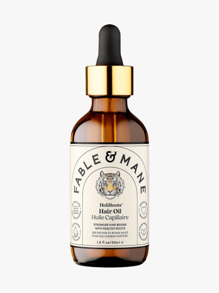 Fable & Mane HoliRoots Hair Oil in branded dropper component on a light gray background